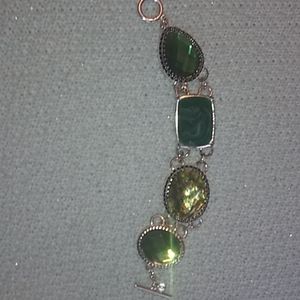 Emerald green bracelet and 2 sets of earrings